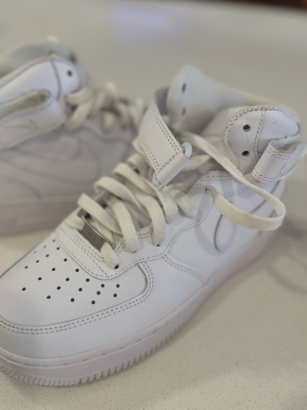 Nike Air Force 1 High ’07 Triple White High Top Sneakers